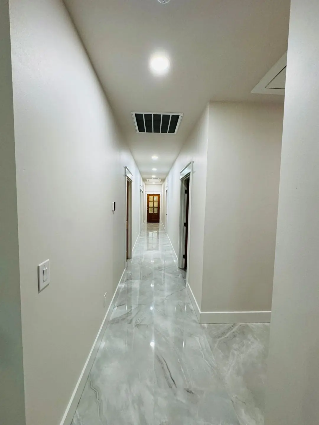 Finished interiors: pantry door, hallway, room