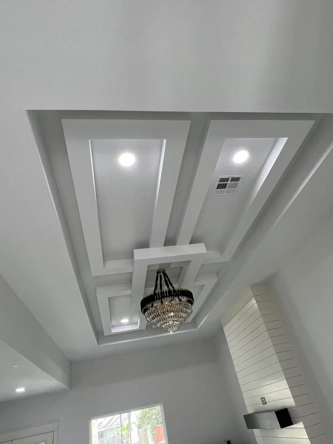 Finished ceiling coffer with chandelier + shiplap
