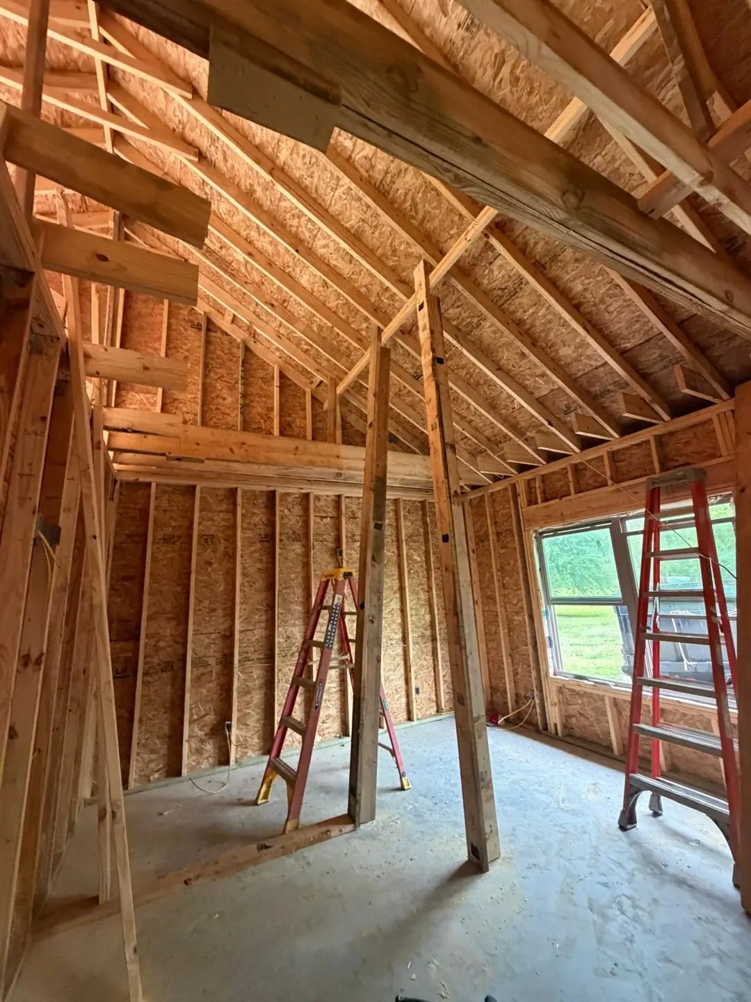 Interior framing, tray/coffered ceiling frame, worker on ladder, Port Acres, TX