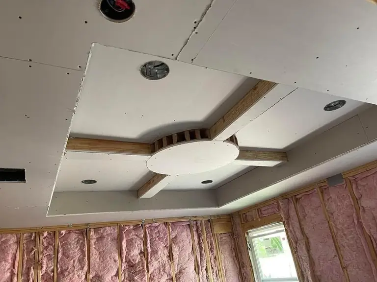Tray ceilings, insulation visible