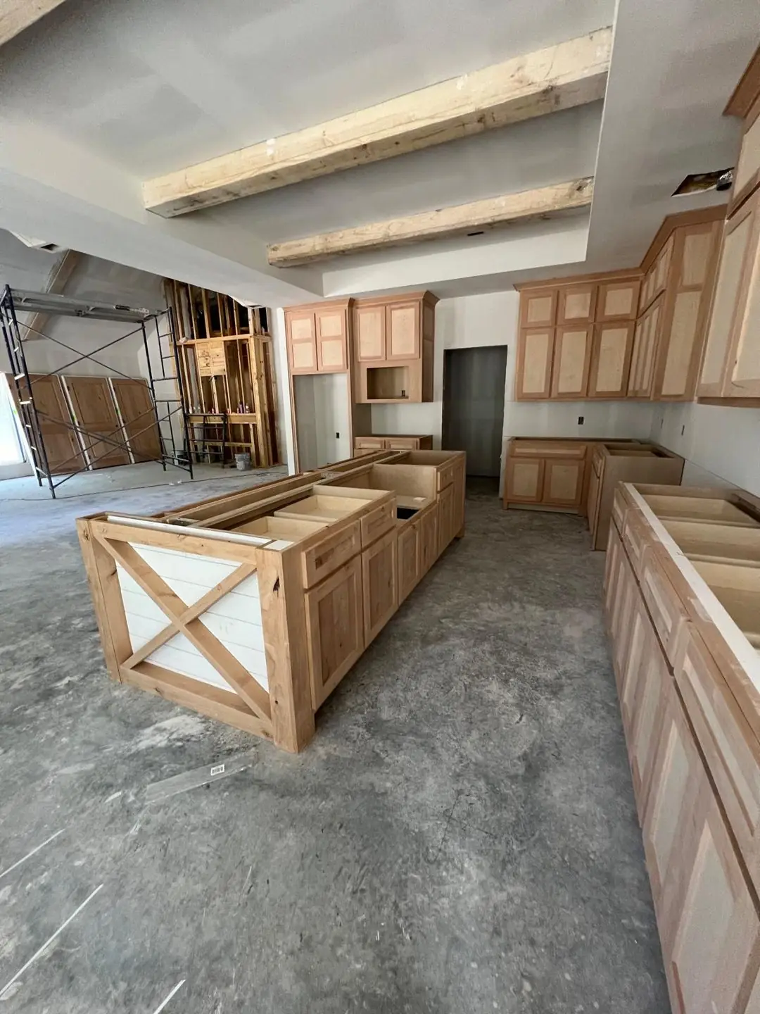 Kitchen cabinets going in / unfinished island, cabinet install crew