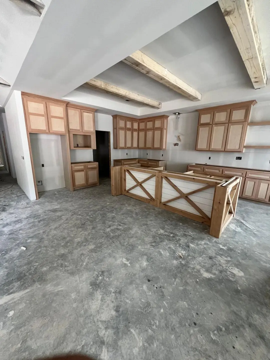 Kitchen cabinets going in / unfinished island, cabinet install crew